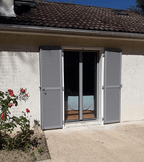 Porte fenêtre et volets battants